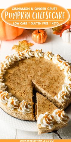 a pumpkin cheesecake on a white plate with a slice cut out and the words cinnamon & ginger crust pumpkin cheesecake low carb gluten free keto