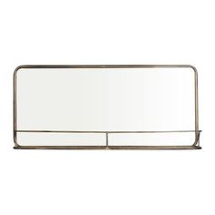 a mirror that is sitting on top of a shelf