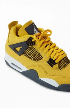 The iconic retro Air Jordan 4 Lightning returns in 2021. Inspired by Michael Jordan's Motorsports team, this bright yellow nubuck shoe with black netting and contrast wings will take your sneaker collection back to 2006. Authentically screened through PacSun's PS Reserve program, grab this limited release style before they're gone for good. Air Jordan 4 Retro Lightning, Jordan 4 Retro Lightning, Jordan Retro 4, Retro 4, Air Jordan Sneakers, Jordan 4 Retro, Air Jordan 4 Retro, Air Jordan 4, Mens Sportswear