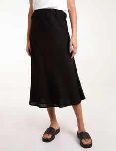 Slip into this elegant linen skirt this summer. A simple skirt that allows your top half and accessories to do all the talking. 50% Rayon, 38% Cotton, 12% Linen Made in India Machine washableElasticated waist UnfastenedModel wears size SModel height: 5ft 10 / 178cm Relaxed Linen Maxi Skirt For Vacation, Casual Linen Skirt For Vacation, Linen Flowy Skirt For Vacation, Linen Long Skirt For Vacation, Flowy Linen Skirt For Vacation, Long Linen Skirt For Vacation, Linen Skirt For Vacation, Vacation Long Linen Skirt, Versatile Summer Midi Skirt