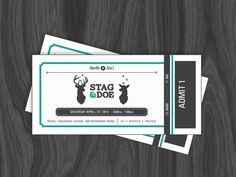 two tickets for stag and doe are sitting on a table