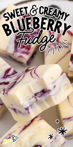 several pieces of blueberry fudge on a plate with the words sweet and creamy