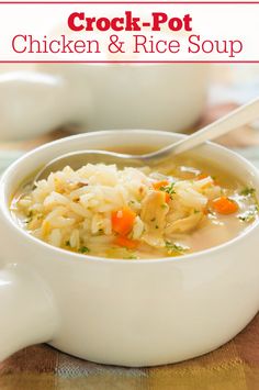 two white bowls filled with soup on top of a table