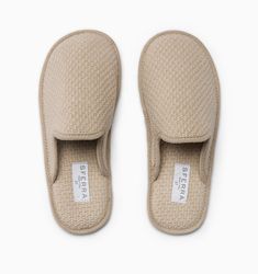 A modern take on timeless comfort, the Lena slipper is a reimagined version of our beloved Serena slipper. Made in Italy using soft 100% cotton, Lena is made using a basketweave technique for textural interest and enhanced durability. Outfitted with a nonslip coating on the outsole, the slipper is a perfect companion for days spent enjoying a slower pace at home. Classic Slip-on Slippers With Textured Sole, Women’s Slippers, Soft Slip-on Slippers For Loungewear, Luxury Modern Slip-on Slippers, Beige Textured Slip-on Slippers, Slipper For Women, Hotel Slippers, House Guest Gifts, Comfortable Wool Slip-on Slippers