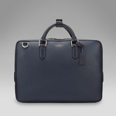 Timeless Rectangular Briefcase For Travel, Timeless Rectangular Travel Laptop Bag, Timeless Rectangular Laptop Bag For Travel, Timeless Rectangular Travel Briefcase, Office Satchel Briefcase With Zipper Closure, Classic Leather Briefcase With Zipper Closure, Classic Formal Laptop Bag, Timeless Workwear Briefcase With Luggage Sleeve, Classic Satchel With Luggage Sleeve