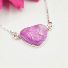 This lovely sterling silver heart pendant showcases a handcrafted flower-infused polymer clay stone. ◄Size Bead Dimension: 14mm ◄Color The color of the bead will depend on the color of the flowers you send and the color(s) of the polymer clay you select. We can create a single-color bead or design a blend of up to 3 colors. ◄Flowers Needed This pendant requires at least 8-10 petals to create. If you have smaller flowers such as hydrangea, mum, monkshood, etc., send a few more blooms. We keep you Polymer Clay Stone, Sterling Silver Heart Bracelet, Silver Heart Bracelet, Sterling Silver Heart Pendant, Silver Heart Pendant, Sterling Silver Heart, Heart Bracelet, Flower Petals, Small Flowers