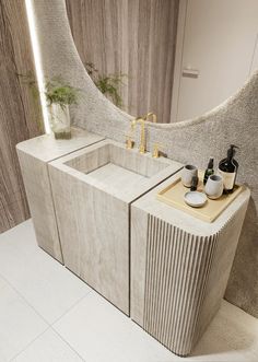 a bathroom with a sink, mirror and counter top in the middle of the room