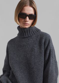 Color: Dark Grey Midweight wool blend fabric Oversized fit Turtleneck Drop shoulders Rib knit trim Small gem embellishment on the back Slip on style Unlined 70% Wool 30% Polyamide Hand Wash or Dry Clean By Sportmax. Imported