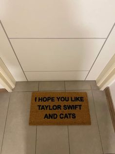 a door mat that says i hope you like taylor swift and cats on the floor