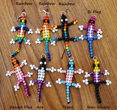 the beaded cross earrings are all different colors and sizes, but each one has an individual's name on it