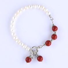 Cultured Freshwater Pearl And Semi Precious Stone Toggle Bracelet Real Freshwater Pearl And Semi Precious Stones: 8mm Red Jasper, Fresh Water Pearl Beads Bracelet Length: Approximate 7inch/18cm. Retails For $225.00 Material: Silver Plated Clasp Type: Toggle Elegant Red Pearl Bracelets, Red Pearl Bracelets For Gifts, Red Pearl Bracelets For Gift, Red Pearl Bracelets As A Gift, Elegant Red Beaded Bracelets With Lobster Clasp, Red Jasper Bracelet, Semi Precious Stone Bracelet, Crystal Anklet, Semiprecious Stone Jewelry