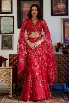 Red attached cancan structured mermaid lehenga features intricate cutdana, dori, red sequins, beads, and floral applique work embroidery. Comes with matching padded blouse with floral applique detailing highlighted with nalki crystals and beads and a heavily embroidered dupatta with botanical motifs. - Aza Fashions Mermaid Lehenga, Cutdana Work, Baju Kahwin, Latest Bridal Lehenga, Lehenga Red, Red Mermaid, Applique Work, Flower Motifs, Lehenga Skirt