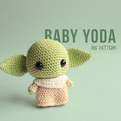 a crocheted baby yoda doll is shown in front of the words, baby yoda pattern