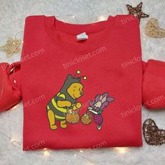 Winnie The Pooh And Piglet Halloween Embroidered Sweatshirt, Disney Cartoon Embroidered Hoodie, Halloween Embroidered Shirt Welcome to Tinicloset, where each stitch tells a story and every garment is a canvas painted with whimsy and warmth. Step into our world of custom embroidered shirts, sweatshirts, T-shirts, and hoodies, where threads weave tales of joy, nostalgia, and... Piglet Halloween, Winnie The Pooh And Piglet, Cartoon Hoodie, Pooh And Piglet, Embroidered Shirts, Pumpkin Sweatshirts, The Embrace, 3d Shirt, Embroidered Sweatshirt