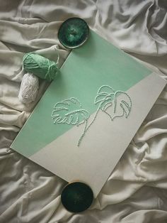 a white sheet with some green items on it