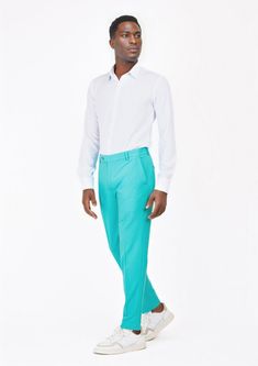 Be bold in our Aqua Blue Stretch Pants. Made with a stretch cotton fabric, these custom made pants will move with you and stand out wherever you go. Fitted Cotton Ankle-length Bottoms, Fitted Cotton Ankle-length Pants, Blue 4-way Stretch Bottoms For Spring, Spring Blue 4-way Stretch Bottoms, Blue Wide-leg Pants With 4-way Stretch, Blue Slim Fit Bottoms For Spring, High-waisted Cotton Chinos, Fitted High-waisted Cotton Chinos, Blue Tapered Leg Pants With Straight Fit