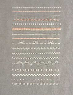 a piece of gray fabric with different designs on the front and back of it,