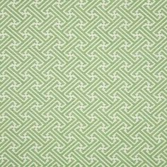 a green and white pattern on fabric