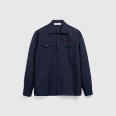 100% virgin wool Woven Spread collar Front button closure Long sleeves Button cuffs Straight hem Flap chest pockets with button closure Stitched logo at the left chest pocket Van Accessories, Hiking Sneakers, Wool Shirt, Lifestyle Art, Active Shorts, Pant Shirt, Jean Paul Gaultier, Chest Pocket, Short Tops