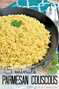 a bowl filled with parmesan couscous and garnished with cilantro