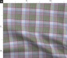 a close up view of a plaid fabric in grey, pink and blue colors on a white background