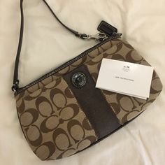 New Condition- Never Used, With Care Instructions And Box Elegant Brown Wristlet For Evening, Elegant Brown Evening Wristlet, Coach Brown Wristlet For Formal Occasions, Brown Coach Wristlet For Formal Occasions, Formal Brown Coach Wristlet, Madewell Shirts, Steve Madden Heels, Bags Coach, Zip Wallet