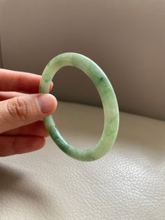 Carved Round Bracelets For Wedding, Green Carved Round Bangle, Carved Round Wedding Bracelets, Wedding Carved Round Bracelets, Carved Jade Round Bracelets, Carved Jade Bracelets, Carved Jade Bracelet, Carved Round Bangle For Formal Occasions, Carved Round Bangle For Formal Events