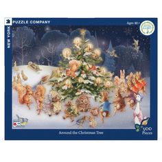 a christmas tree with angels around it and other animals around it in front of a snowy background