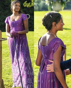 a woman in a purple dress standing next to a man