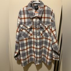 Cozy Button Up White, Gray And Orange Flannel. Stylish And Comfortable You’ll Want To Wear It All Day. Cheap Button-up Flannel Shirt With Snap Buttons, Orange Flannel, Big Shirt, Juicy Couture Charms, Women's Button Down Shirt, Haute Hippie, Striped Long Sleeve Shirt, Shoulder Shirts, Floral Print Tops