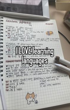 a notebook with writing on it that says i love learning languages