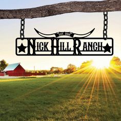 a metal sign that says nick hill ranch