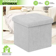 the storage ottoman is in grey fabric