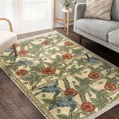 an area rug with flowers and birds on it