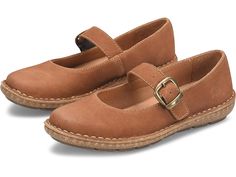 Born Naomi - Women's Clog/Mule Shoes : Tan : Vintage and classy, don the comfort of the B&amp,#248,rn Naomi shoes styled with authentic stitching patterns. Hand-finished nubuck leather upper. Breathable and soft leather lining with removable soft fabric suede footbed with extra foam. Buckle closure along the front strap. Round toe construction. Opanka hand-crafted construction. Lightweight and flexible cork-infused rubber outsole for high traction. Imported. Casual Clogs With Flat Heel And Heel Loop, Cushioned Footbed Clogs For Walking, Stitching Patterns, Mule Shoes, Womens Clogs, Nubuck Leather, Shoe Style, Soft Suede, Mules Shoes