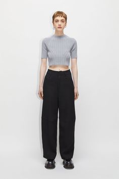 High Waisted workwear-inspired suit trousers, with a wide barrel leg fit, slightly cropped. Flattering fit at waist and hips. Double jetted pocket at back and side pockets at front, cut off seams with heavy topstitch at leg, made in a spongy twill fabric in 51% cotton and 49% lyocell. Pairs with Blade Blazer in the same fabric, for a contemporary suit look. 51% Cotton 49% Lyocell - Contemporary worker suit trouser - Barrel leg - Slightly cropped - Flattering fit at waist and hip Fitted Cropped Workwear Pants, Cropped Bottoms With Belt Loops For Workwear, Fitted Cropped Bottoms With Belt Loops, Cropped Workwear Pants With Pockets, Cropped Work Pants With Pockets, Cropped Pants With Pockets For Work, Cropped Workwear Bottoms With Pockets, Tailored Cropped Bottoms For Work, Modern Cropped Bottoms For Work