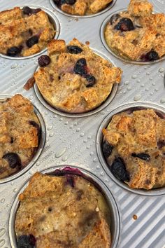 muffins with blueberries and other toppings in a pan