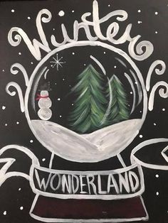 a chalkboard drawing of a snow globe with trees in it and the words winter wonderland written below