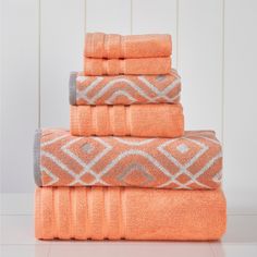 four towels stacked on top of each other