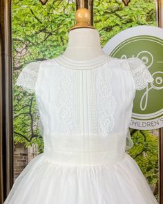 Made in Spain Dry Clean Final sale, no exchanges nor returns will be processed after purchase Elegant A-line Confirmation Dress, Tulle Dress With Fitted Bodice For Confirmation, Elegant Cream Dress With Sheer Bodice, Cream Tulle Dress With Sheer Bodice, Formal Organza Dress With Boned Bodice, Elegant Organza Dress With Lace Bodice, White Dresses With Sheer Bodice For Ceremonies, Cream Ball Gown With Fitted Bodice, Lace Ball Gown Dress With Lined Bodice