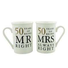 two white coffee mugs with the words 50 years of being mr and mrs right