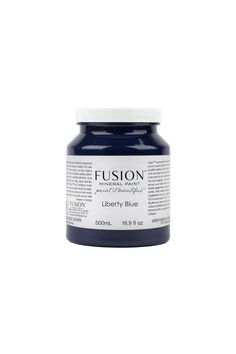 a jar of midnight blue acrylic paint on a white background with the words, futon