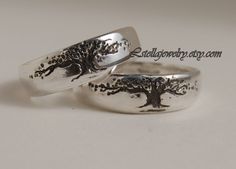 "Band - Tree of Life design in a slightly Tapered light weight Band. I carve the tree design in wax and then cast it in sterling. A great ring for the \"green\" person in your life. Offered here in a set of two. For the lover of trees and interconnection of life on our planet. I usually can get these out in a couple of day to a week. Please feel free to contact me for rush orders. About 6mm or almost 1/4\" at the widest point and tapers to 3.5mm,(approx.) at the narrowest point. Edges are rounde Symbolic Silver Couple Rings For Wedding, Unique Engraved Wedding Ring, Unique Wedding Engraved Ring, Silver Sterling Silver Wedding Jewelry, Personalized Silver Rings For Wedding, Handmade Silver Promise Ring, Silver Sterling Engraved Ring For Marriage, Engraved Sterling Silver Couple Rings For Wedding, Personalized Silver Rings For Marriage