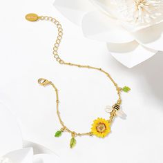 The bee symbolizes community, brightness, and personal power. Follow the bee to discover your new destination. Bee Gifts for bee lovers. Bee bracelets, high polished make bee & sunflower bracelet is very shining, very dainty, and pretty and simple but elegant. Detail Plating: 18K Gold Materials: 18K Gold on Brass, Enamel Size: Length: 6.30"(16cm)+Extender: 2.36"(6cm) Weight: 4.3g Hypoallergenic design Dainty Yellow Bracelet For Gift, Dainty Yellow Bracelet As Gift, Yellow Bracelets With Flower Charm For Gift, Bee Sunflower, Bee Bracelet, Sunflower Bracelet, Cat Pendant Necklace, 18k Gold Bracelet, Unique Gift Wrapping