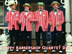 four men in red and white striped suits are standing on the front steps of a house