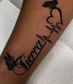 a person with a tattoo on their arm