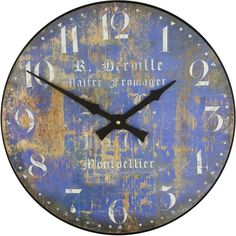 a clock that is on the wall and has numbers painted on it with rusted paint