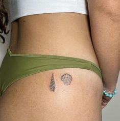 Ocean Aesthetic Tattoo Ideas, Spine Tattoo Animal, 3 Starfish Tattoo, Mermaid Tattoo On Hip, Locals Only Tattoo, Shells Tattoo Ideas, Costal Tattoos, Tattoo Ideas Female Ocean, Cute Ocean Tattoos