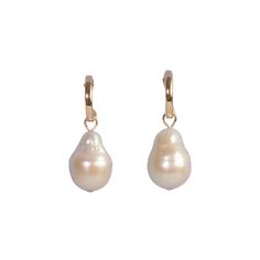 These baroque pearl earrings are a classic and a staple — Each set of pearls are different and won't look exactly like the ones pictured due to the nature of freshwater pearls. Choose from the drop-down menu if you want 14k gold-filled huggies hoops included, or just the charms alone. Each item is made-to-order. Please allow a processing time of 14 business days. We value your patience and appreciation of the handmade process! Please see the FAQ and Policies pages for additional information and care instructions. Classic Baroque Pearl Earrings With Pearl Charm, Luxury Baroque Pearl Drop Earrings, Elegant Baroque Pearl Pendant Earrings, Luxury Baroque Pearl Earrings With Pendant, Luxury Gold Baroque Pearl Earrings, Baroque Pearl Earrings, Pearl Charms, Earring Sale, Baroque Pearls