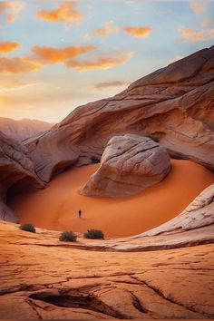 a person standing in the middle of a desert